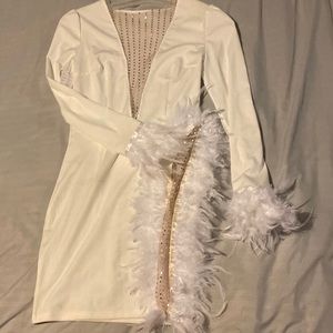 White part dress with feathers open on the left side